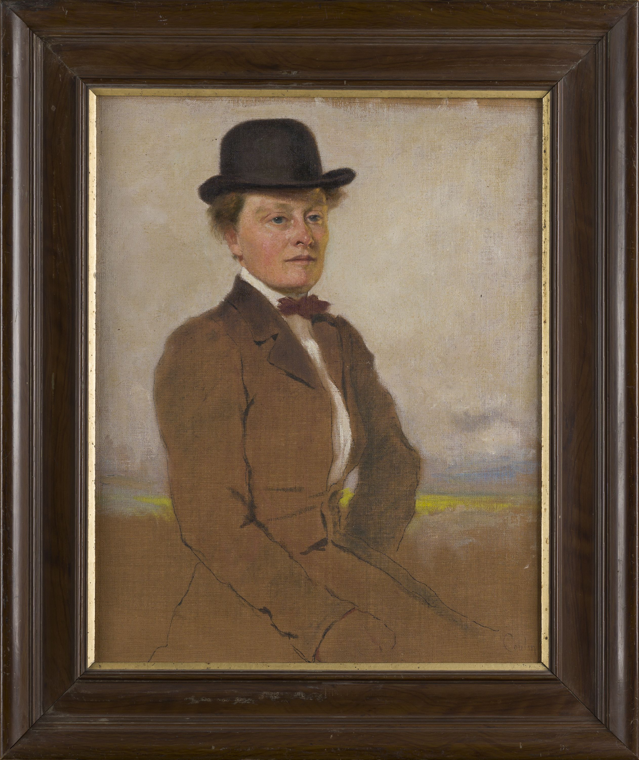 Woman in a riding suit
